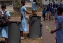 Blind student effortlessly walk to dispose of waste