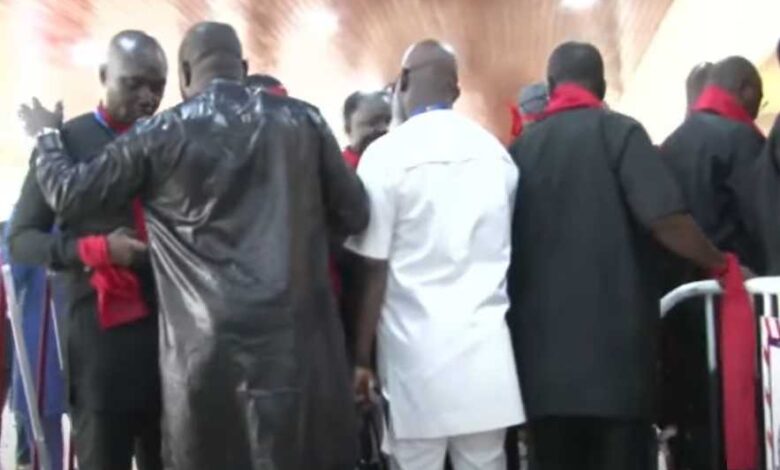 Minority MPs clad in red and black to protest suspension of MPs