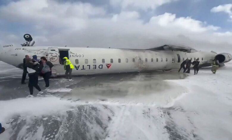 Delta plane crashes and flips upside down at Toronto airport