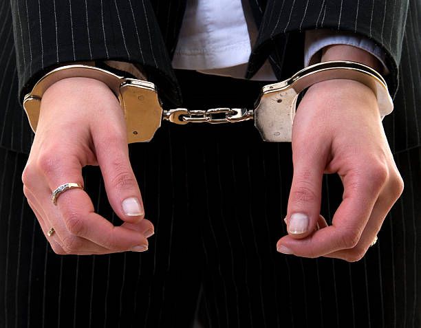 File photo: Woman in handcuffs