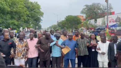 Minority MPs march to police HQ to demand action