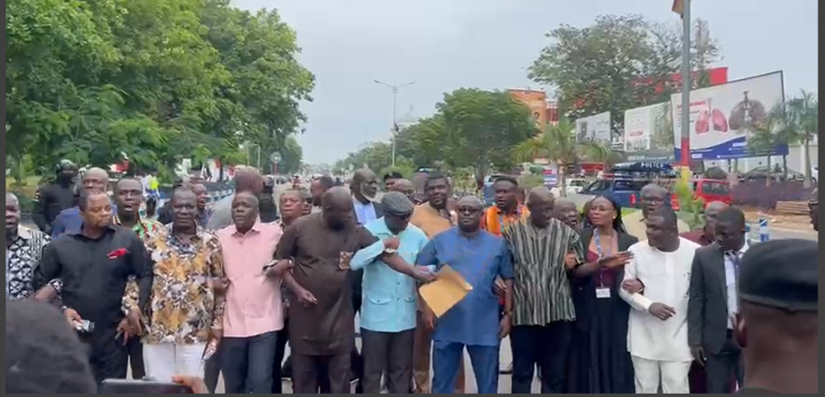 Minority MPs march to police HQ to demand action