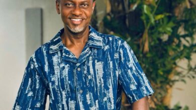 Israel Laryea beams with pride as son returns from US with special gift
