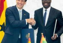 Finance Minister signs key debt deal with Germany