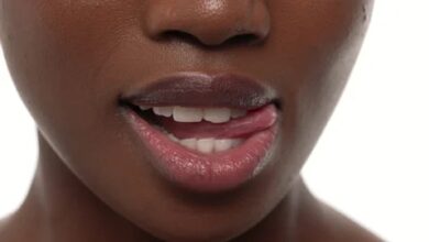 What it really means when a girl bites her lips