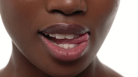What it really means when a girl bites her lips