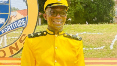 Catholic Priest graduates as a prison officer